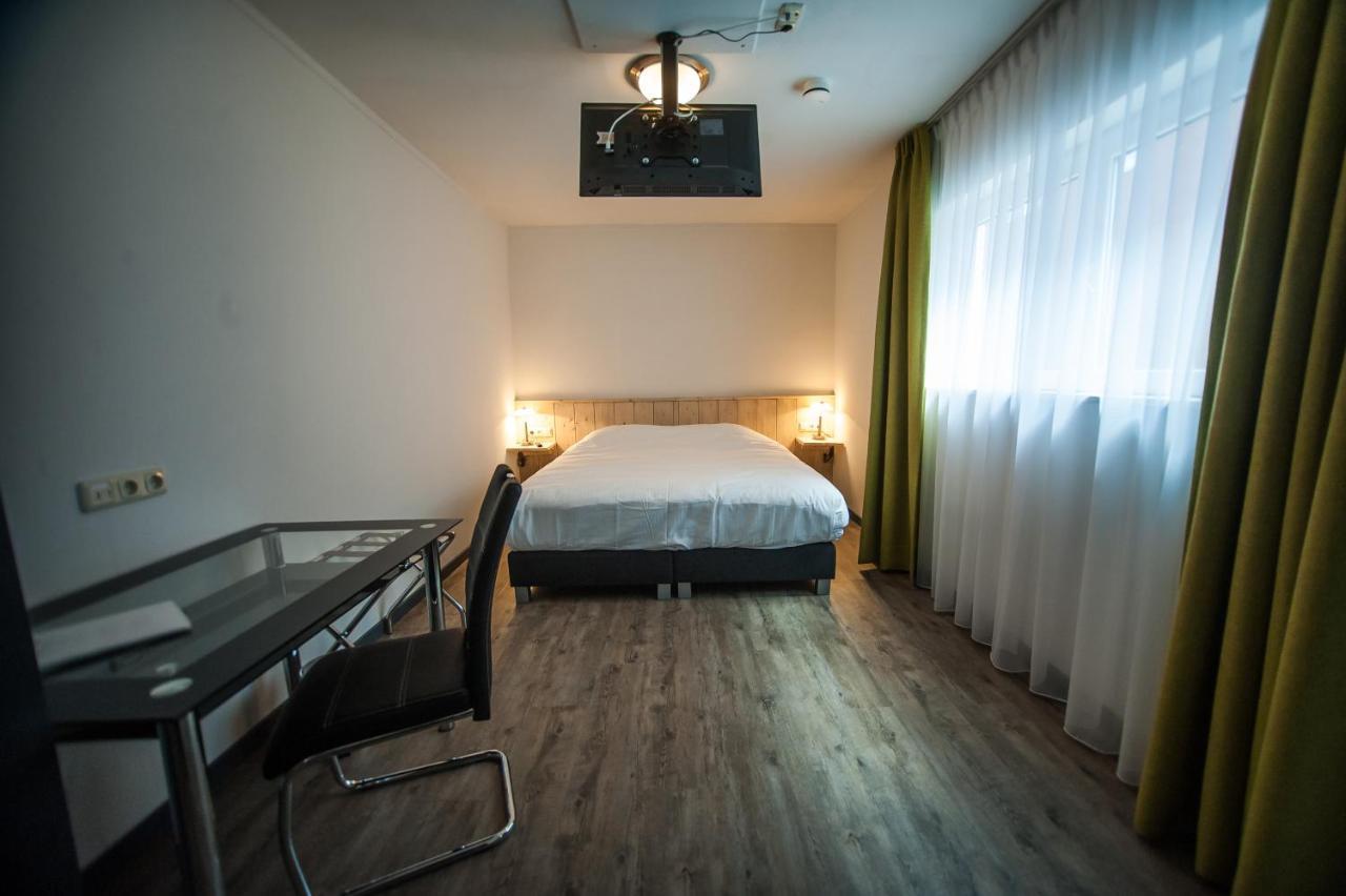 Hotel Taurus Cuijk Bagian luar foto
